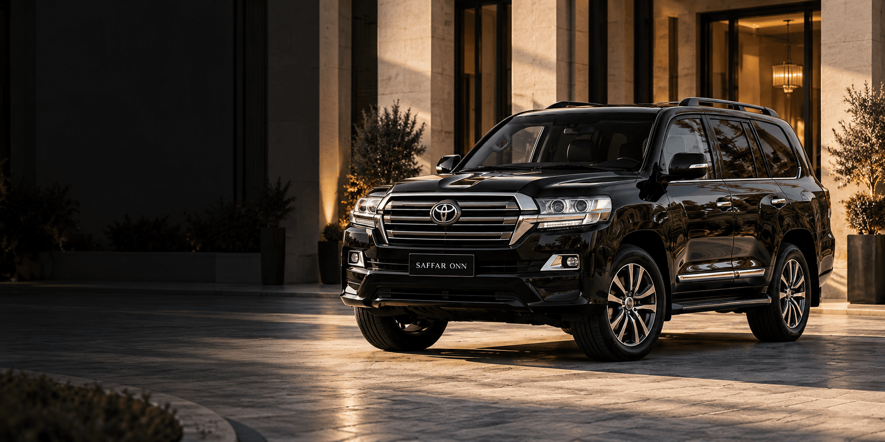 Toyota Land Cruiser V8 ZX at a luxury hotel entrance