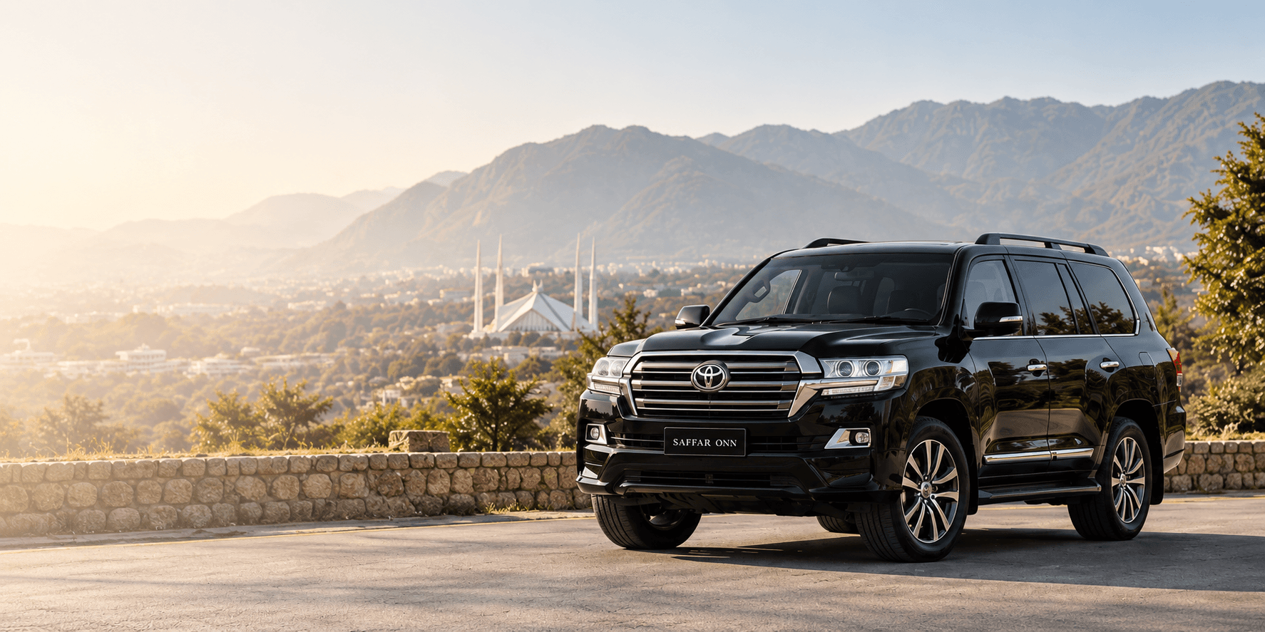Black Toyota Land Cruiser overlooking Islamabad and the Margalla Hills
